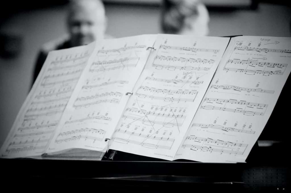 Sheet music on a stand ready to play.